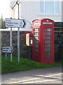 SW6821 : Cury: postbox № TR12 36 and phone, White Cross by Chris Downer