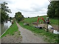 SU2764 : Canal repair team's digger, north-east of lock 64 by Christine Johnstone