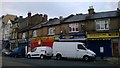 TQ3268 : Food store and Caribbean takeaway, Woodville Road, Thornton Heath by Christopher Hilton