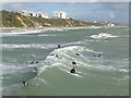 SZ0890 : Bournemouth: surfers enjoy the waves by Chris Downer
