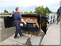 Operating the top lock at the Muirtown flight, Caledonian canal