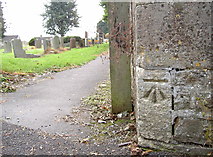 ST8744 : Benchmark by Christ Church graveyard by Neil Owen