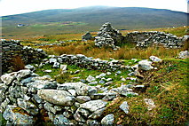 F6307 : Achill Island - Deserted Village - Cottage Ruins &  a Habitable Cottage in Distance by Joseph Mischyshyn