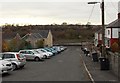 Line of cars parked in Lon Las Avenue, Skewen