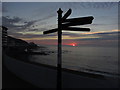 SS4329 : Signpost silhouette at sunset, Westward Ho! by Colin Park
