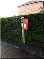 TM3491 : Yarmouth Road Postbox by Geographer