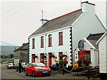 M2208 : Ballyvaghan - White & Red B&B next to Monk's Pub - Side View by Joseph Mischyshyn
