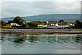 M2308 : Ballyvaghan Cottages along a bay in front of Moneen Mountain (305) by Joseph Mischyshyn
