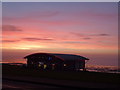TF6740 : Sunset over Hunstanton "Pier" by Richard Humphrey