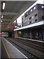 Southbury station and flats beyond