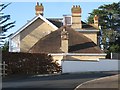 Large house of cream brick, corner of New Road and Stapleford Drive
