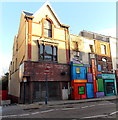 Contrasting shop fronts in Swansea High Street