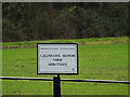 TL2259 : Caldecote Manor Farm sign by Geographer