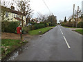 TL2462 : High Street & Toseland Postbox by Geographer