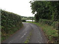 H6310 : Sharp bend in the Killyrue Road by Eric Jones
