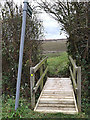 TL3059 : Footbridge of the footpath to Crow Dean bridleway by Geographer
