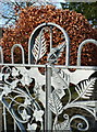 Tree frog on metal gate at Lumb Fold