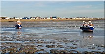 TQ8884 : Fishing boats aground on Southend Flats towards low tide by Chris Morgan