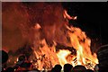 NT0437 : Sparks flying at the Biggar Bonfire, Hogmanay 2013 by Jim Barton