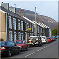 Row of cars and row of houses, Tonmawr Road near Efail Fach