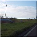 Milestone beside the A35 dual carriageway