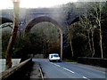 SS7994 : B4286  under an arch of a former railway viaduct, Pontrhydyfen by Jaggery
