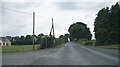 N7185 : The Rathbane Cross Roads on the Newcastle Road by Eric Jones