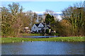 House seen across River Thames floodwater