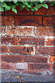 Benchmark on wall outside #40 Clarendon Road