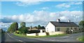 N8384 : Cottages at the junction of the R162 and the L34012 at Arrigal  by Eric Jones