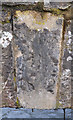 Lettering on a stone on the downstream side of Mole Bridge at South Molton