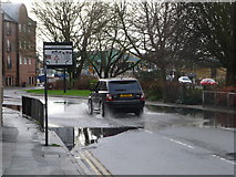 SZ0090 : Poole: minor flooding in West Street by Chris Downer