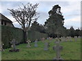 Saint Peter, Hascombe: crosses in the churchyard