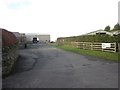 NU1230 : Entrance to Bellshill Farm by Graham Robson