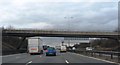 M1 passes under a footbridge