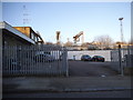 Car park and railway lines by Heather Park Road