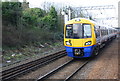 Passenger train east of Willesden Junction Station