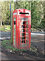 Vandalised K6 telephone box by Decoy Farm