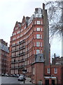 London: wedge-shaped apartment block in Kensington Gore