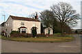 House and former cafe on the corner of Pinfold Lane