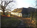 Retail Trust buildings from Mill Hill School path