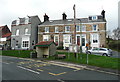 Houses, bus shelter and village notice board, Fylingthorpe