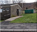 Green body of a former railway wagon in Cwmaman