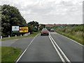 TM4977 : A1095, Haleswoth Road, Passing St Felix School by David Dixon