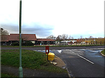 TM3388 : Woodlands Drive Postbox & Three Willows Garden Centre by Geographer