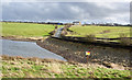 Parsonage reservoir above the road causeway