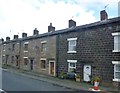 SD6422 : Terrace housing and cobbles on Bolton Road in Abbey Village by Raymond Knapman
