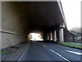 Road passes under flyover carrying the A414