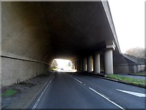 TL1006 : Road passes under flyover carrying the A414 by Bikeboy