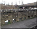 Holes in the wall opposite George and Dragon pub, Apperley Bridge